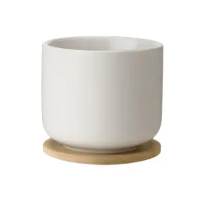 Stelton Theo Becher mit Untersetzer sand